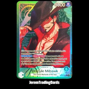 May include: A holographic trading card featuring Dracule Mihawk from "The Seven Warlords of the Sea." The card has a green background with a portrait of a character in a black hat and red attire. The card text includes game instructions and a power level of 5000.
