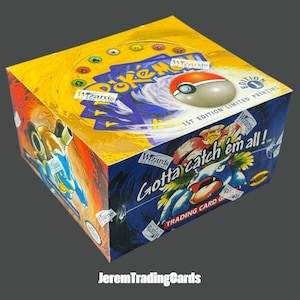 May include: A sealed yellow and blue Pokémon trading card game booster box featuring the text Gotta catch em all! and 1st Edition Limited Printing. The box displays illustrations of Blastoise and a Poké Ball, with the Wizards of the Coast logo.