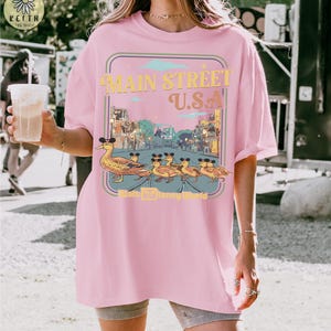 Comfort Colors Disney Duckling Main Street USA T Shirt, Walt Disney World Magic Kingdom Tee, Cute Animal Lovers Gift, WDW Family Trip Outfit Blossom/Light Pink