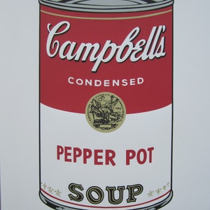 May include: A red and white Campbell's Condensed Pepper Pot Soup can with a gold label and a gold seal. The can is on a white background with the artist's signature, Andy Warhol, in the bottom right corner. The number 1514/5000 is printed in the bottom left corner.