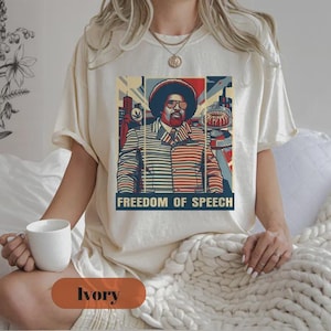 May include: A white ceramic mug with a black handle and the text "But First, Coffee" in a bold, black font. The mug is sitting on a wooden surface. The mug is 4 inches tall.