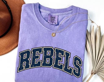 Rebels PNG, Blue Striped Rebels Mascot PNG, Varsity School Spirit Shirt Design, Team Spirit, Game Day Sports Sublimation PNG