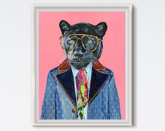 May include: A black panther wearing a blue jacket with a white and black patterned design, a white shirt, and a colorful patterned tie. The panther is wearing gold-rimmed glasses and has a pink background.