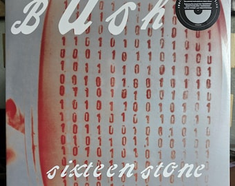May include: A vinyl record album cover for the band Bush. The album is titled "Sixteen Stone" and features a red and white design with binary code. The band's name is in white script. A sticker indicates it's a limited edition.