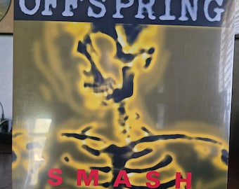 May include: Sealed vinyl record album by The Offspring, titled "Smash." The album cover features the band's name in white block letters above a yellow and black skeletal graphic. The word "SMASH" is in red block letters.