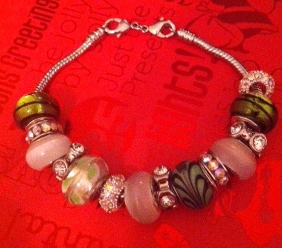 Items similar to Green Charm Bracelet on Etsy