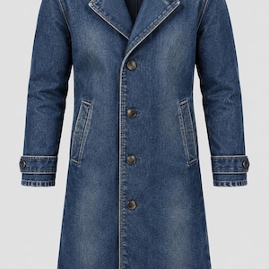 May include: A long, dark blue denim coat featuring a notched lapel collar, a four-button front closure, and two side pockets. The sleeves are finished with adjustable buttoned cuffs, and the fabric displays a faded wash throughout the garment.