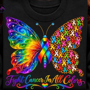 May include: A black sweatshirt featuring a large butterfly graphic. The left wing is a vibrant rainbow galaxy pattern, while the right wing has a leopard print background filled with various colored awareness ribbons. Text reads: Fight Cancer In All Colors.