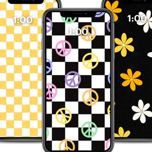 May include: Three smartphones displaying unique wallpaper designs. One features a yellow and white checkered pattern, another showcases a black and white checkered pattern with peace symbols, and the third has a black background with flowers.