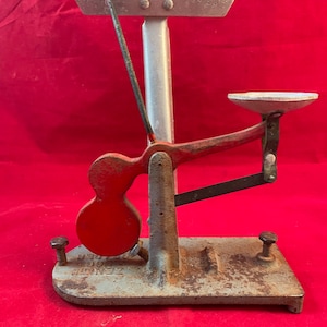 Sold at Auction: Antique primitive Mascot egg scale