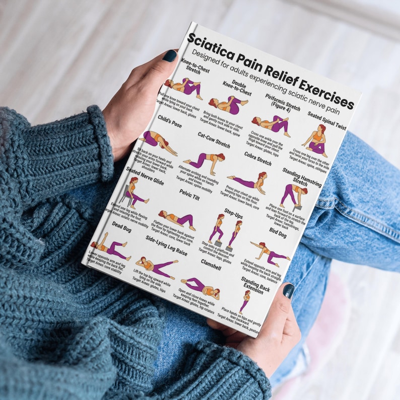 May include: A book titled "Sciatica Pain Relief Exercises" is held by a person. The cover is white with purple text and illustrations of various stretches. The exercises are designed for adults experiencing sciatic nerve pain.