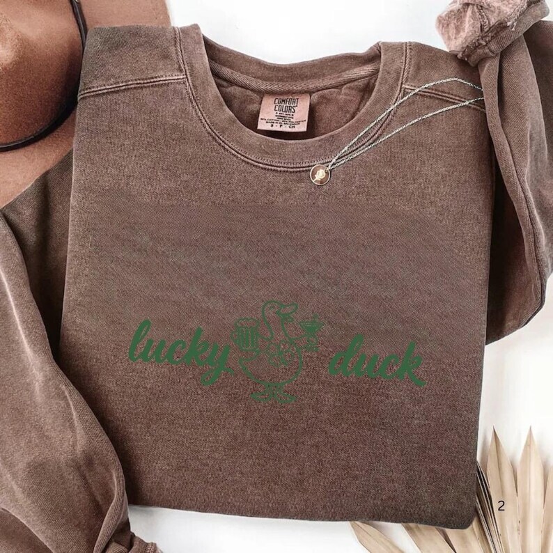 lucky duck shirt,st patricks tee,st patricks day tee,st paddys day shirt,drinking shirt,baby tee y2k,St Patty's Day shirt,St Patrick's Day Tee,trendy baby tee,Shamrock shirt,Lucky shirt,I Put The Double Tee,Funny Duck Shirt,Four Leaf Clover Tee,Feeling Lucky shirt,Feeling Lucky,Coquette St Patricks,clover shirt,Clover Funny Irish,Boxy Crop top