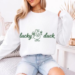 lucky duck shirt,st patricks tee,st patricks day tee,st paddys day shirt,drinking shirt,baby tee y2k,St Patty's Day shirt,St Patrick's Day Tee,trendy baby tee,Shamrock shirt,Lucky shirt,I Put The Double Tee,Funny Duck Shirt,Four Leaf Clover Tee,Feeling Lucky shirt,Feeling Lucky,Coquette St Patricks,clover shirt,Clover Funny Irish,Boxy Crop top