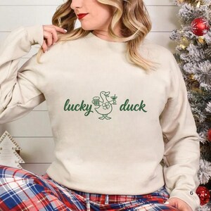 lucky duck shirt,st patricks tee,st patricks day tee,st paddys day shirt,drinking shirt,baby tee y2k,St Patty's Day shirt,St Patrick's Day Tee,trendy baby tee,Shamrock shirt,Lucky shirt,I Put The Double Tee,Funny Duck Shirt,Four Leaf Clover Tee,Feeling Lucky shirt,Feeling Lucky,Coquette St Patricks,clover shirt,Clover Funny Irish,Boxy Crop top
