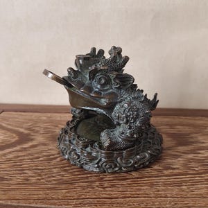 Vintage bronssnidad paddastaty