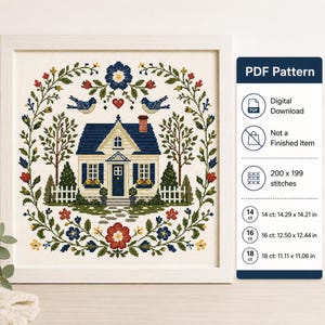 May include: A cross stitch pattern featuring a house with a blue roof, surrounded by a floral wreath with birds and trees. The text reads PDF Pattern, Digital Download, Not a Finished Item, 200 x 199 stitches, and dimensions for 14, 16, and 18 ct.