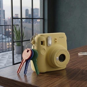 Archivo STL de llavero con cámara: modelo de impresión 3D de minicámara para llavero