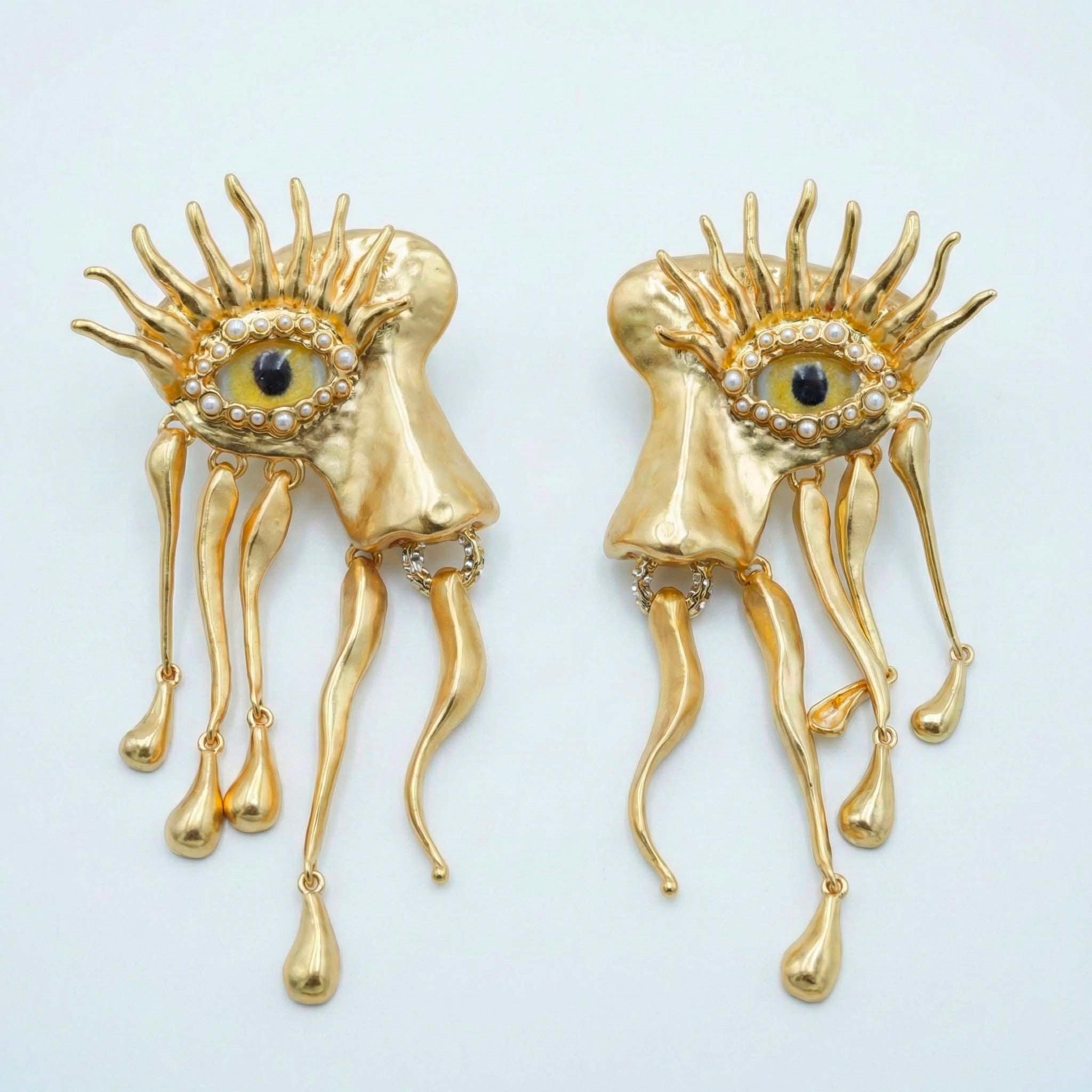 Surrealist Dali style, Schiaparelli inspired anatomy artistic earring studs ? Salvador Dalí Gold-Plated Mini Eye Post Earrings – MoMA  main image 3