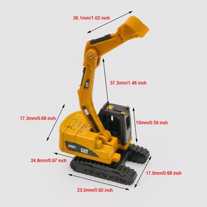 May include: A yellow and black toy excavator with the text "CAT" and "3150L" printed on the side. The excavator arm extends 1.46 inches. The base is 0.92 inches wide and 0.97 inches long. The cab is 0.59 inches tall.