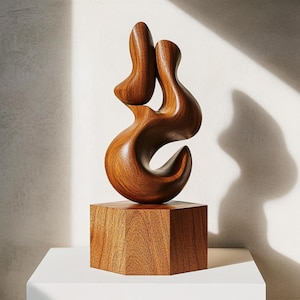 May include: A set of three ceramic mugs with a speckled, matte finish in cream, light grey, and dark grey. Each mug has a simple, minimalist design, suitable for coffee or tea.