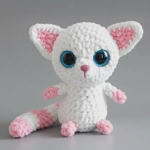 May include: A white ceramic mug with a black handle and the text "But First, Coffee" in a bold, black font. The mug is set against a neutral background, highlighting its simple design.