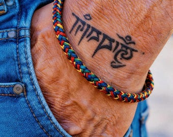 Bracciale tibetano intrecciato a mano con motivo a drago, gioiello spirituale e portafortuna per uomo