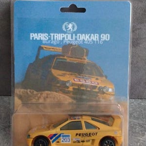 Miniature d'occasion sous blister scellé , Burago 1/43 , Peugeot 405 T16 Dakar
