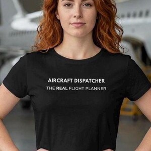 May include: A set of three ceramic mugs with a speckled, matte finish. The mugs are in shades of cream, light gray, and dark gray. Each mug has a simple, minimalist design and a rounded handle.