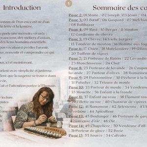 May include: An open book with the title "Introduction" and a table of contents titled "Sommaire des cartes". The book is in French and features a woman wearing glasses working with small figurines. The book is about the Oracle of the Santons of Provence.