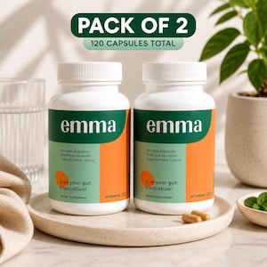 May include: Two white plastic bottles of Emma dietary supplement capsules. Each label features a green and orange design with the text 'emma', 'Promotes Regularity', 'Bloating & Gas Relief', 'Supports Flatter Tummy', and 'give your gut a vacation!'