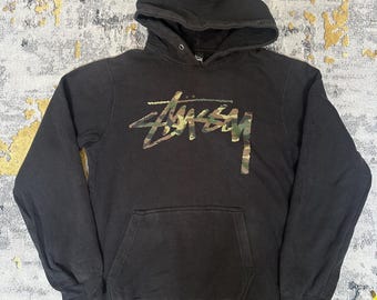 Vintage 90s Stussy Japan Camouflage Logo Design.