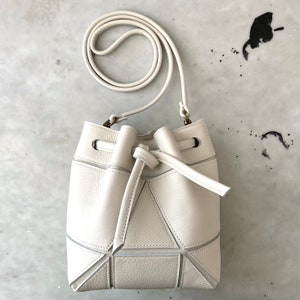 Small bucket bag with origami details drawstring purse made of genuine leather cross body and shoulder purse ivory image 8