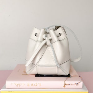 Small bucket bag with origami details drawstring purse made of genuine leather cross body and shoulder purse ivory image 3