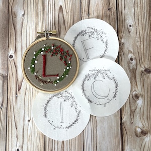 Pack of embroidery wreath stickers with custom initials. Personalised Christmas craft idea. Festive stick and stitch for DIY Xmas ornaments