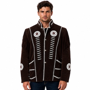 May include: A dark brown suede jacket featuring long fringe on the shoulders, a high collar, and a front button closure. The garment is decorated with white braided trim, white stitching, and circular white and red embroidered floral motifs.