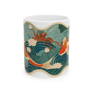 May include: White ceramic mug featuring a Japanese-inspired design. The artwork depicts koi fish swimming among water lilies and stylized waves in shades of teal, orange, and gold. The mug has a curved, wavy border.