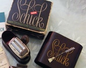 Old Schick Electric Shaver leather  snap leather case Schick script gold lettering  cord pre owned good clean condition works if you choose