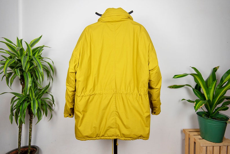 mustard yellow ski jacket