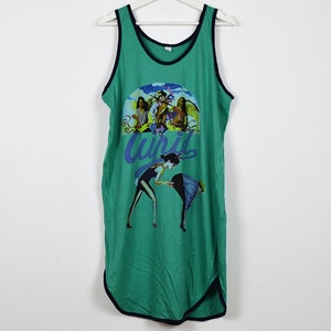 May include: A green tank top with a graphic print of a group of angels and the word "Cupid".