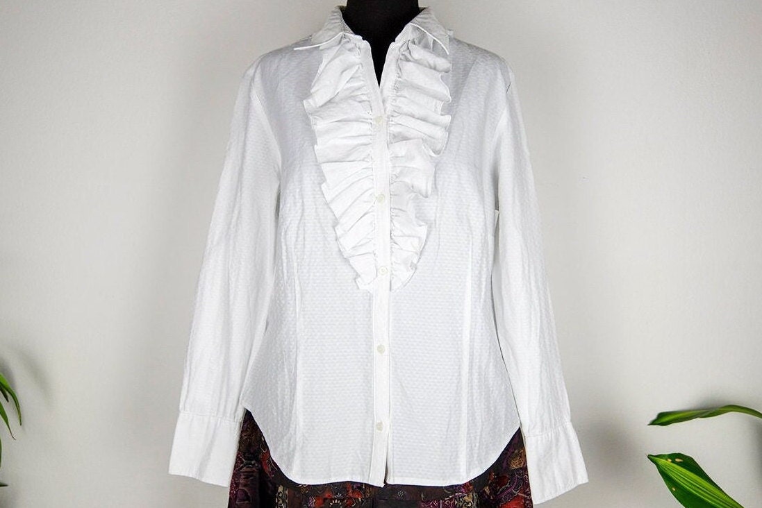 USED USA古着 白 ノースリーブシャツ フリルシャツ vintage il_fullxfull.4372221082_dilk.jpg