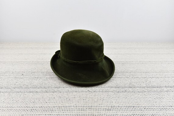 green fuzzy hat