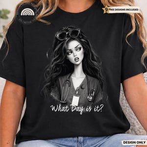 May include: A black t-shirt featuring a graphic of a person with long dark hair wearing glasses on their head, a stethoscope around their neck, and a scrub top with a badge. The text "What Day is it?" is printed in white below the graphic.