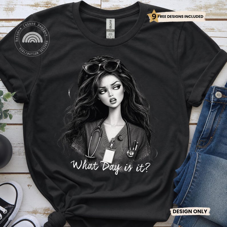 May include: A black short-sleeve t-shirt featuring a graphic of a person with long dark hair wearing glasses on their head, a stethoscope, and a scrub top. The text "What Day is it?" is printed in white below the graphic. A "9 FREE DESIGNS INCLUDED" tag is visible.