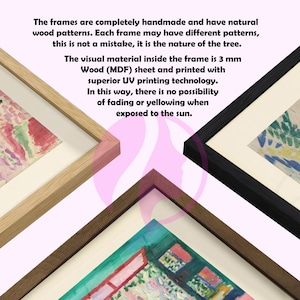 May include: Close-up of three framed art prints with different colored frames: natural wood, pink, and black. The artwork inside each frame features colorful abstract paintings. The frames are handmade and have natural wood patterns.
