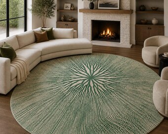 May include: A large, round area rug with a green and cream pattern resembling a stylized tree or plant. The rug is the focal point of a living room, with a sectional sofa and fireplace in the background.