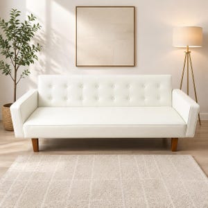 May include: A white sofa with a tufted backrest featuring eight buttons, straight armrests, and four tapered wooden legs. The sofa has a smooth, solid-colored upholstery and a rectangular seat cushion, providing a clean and simple furniture design.