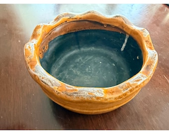 Vintage Ceramic Bowl With Wavy Rim And Rustic Glaze Finish