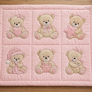 May include: A rectangular light pink quilted fabric panel featuring six embroidered squares. Each square displays a beige teddy bear in different poses, including holding a pink heart, a pink star, wearing a pink nightcap, pink overalls, or holding a smaller bear.