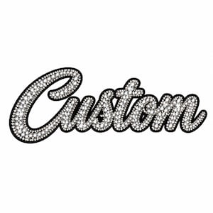 May include: The word Custom written in a cursive script font, featuring a dense fill of small, clear, reflective rhinestones. The lettering is outlined with a thick, solid black border, creating a high-contrast, sparkling appearance.