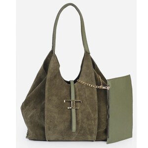 May include: Olive green suede shoulder bag with a matching detachable pouch. The bag features a gold-tone chain and a gold-tone metal clasp with a logo. The bag has a single handle and a soft, unstructured shape.